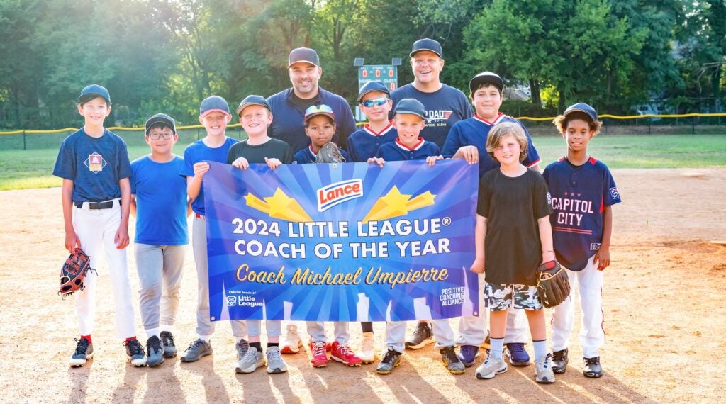 Coach Mike and his little league team.